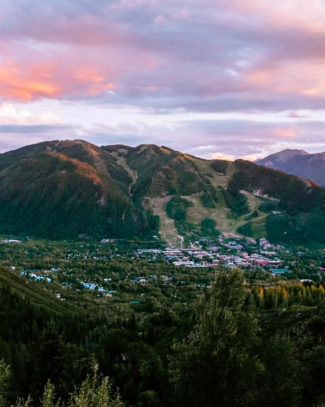 Aspen valley and mountains at sunset