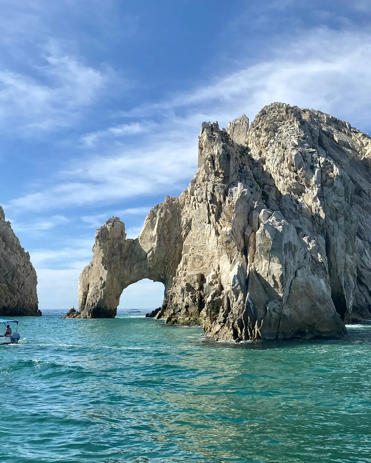 The rock arch at Land's End in Cabo San Lucas above clear water
